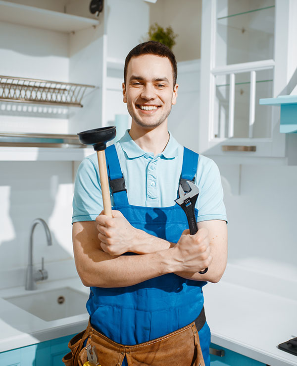 geotagged-cheerful-male-plumber-holds-wrench-and-plunger-2021-08-28-02-49-30-JXEAURY